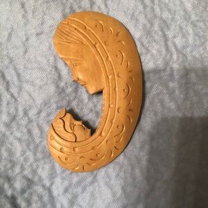 Elegant Italian Carved Tan Wooden Mother and Child Trivet